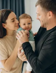 Proud parents standing together