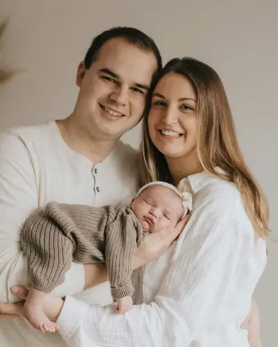 Proud parents standing together