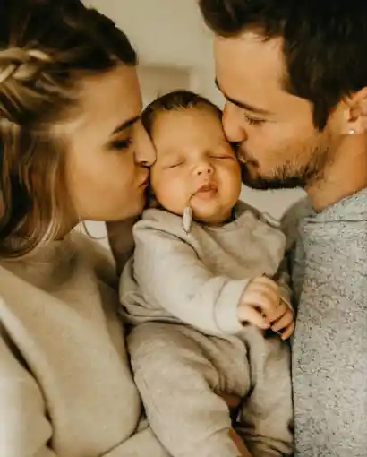 Proud parents standing together