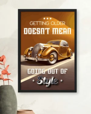 Golden vintage classic car illustration with the quote Getting older doesn't mean going out of style, displayed in a black frame.
